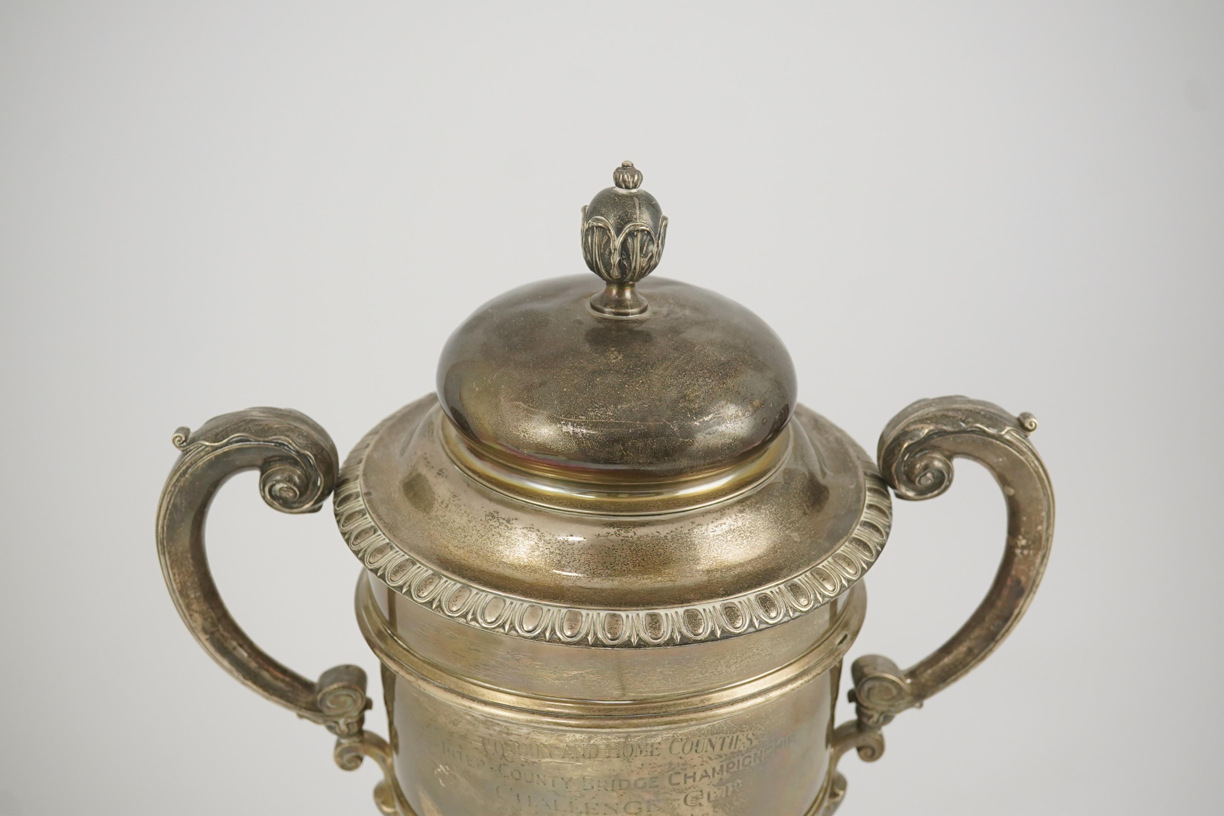 A George V silver two handled presentation trophy cup and cover by Hunt & Roskell Ltd (late Storr & Mortimer)